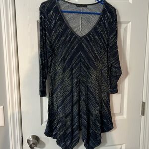 Shark tail hem tunic